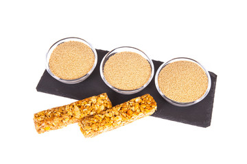 Raw organic amaranth grain on white background