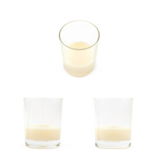 Condensed milk in a glass isolated