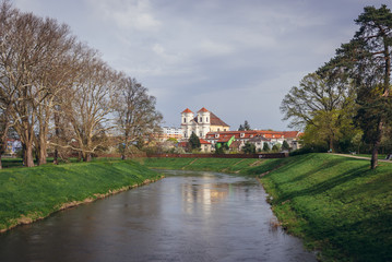 Fototapeta na wymiar Morava River in Veseli nad Moravou, Czech Republic, view with monastery and church of Guardian Angel