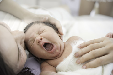 Obraz na płótnie Canvas newborn baby sleep in bed