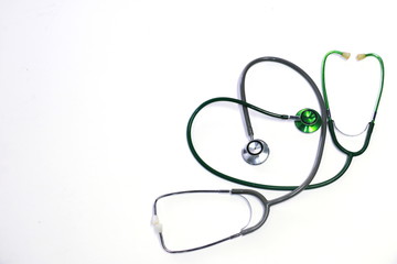Green and silver stethoscope. Stethoscope check heart .Stethoscope show good health and caring...