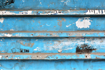 Old blue-tinted corrugated sheet. dirty fence. Original creative background