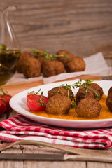Meatballs with carrot purée.
