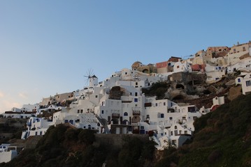 Santorini white and blue houses at sunset
