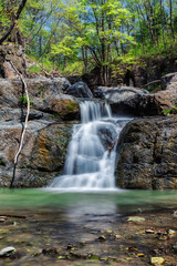 Obraz premium Small waterfall in the forest near Vladivostok, Russia