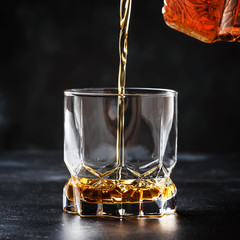 Whiskey Pour In Glass, Dark Background, Selective Focus