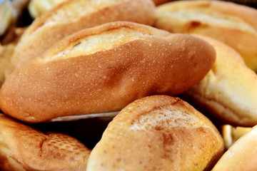 A seamless background of mouth-watering rolls. Close-up