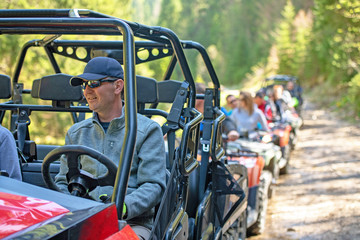 man riding atv vehicle on off road track ,people outdoor sport activitiies theme © FS-Stock