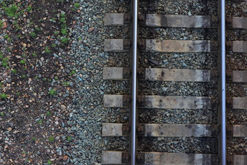 Fragment of the old railway close-up. View from above. Background freight transport