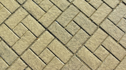 Concrete paver block floor pattern for background.