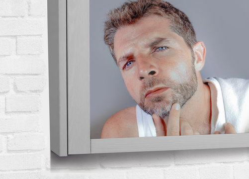 Attractive Worried And Concerned Caucasian Man Looking At Bathroom Mirror Finding More Gray Hair In Beard Frustrated In Unhappy Aging Getting Grey Hairs