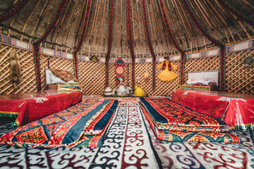 National traditional decoration of the yurt ceiling. Kazakhstani ornament. Vintage weaving of patterns. Yurt decoration. Wooden frame with patterns as an ethnic background, golden horde, Kazakhstan. - obrazy, fototapety, plakaty