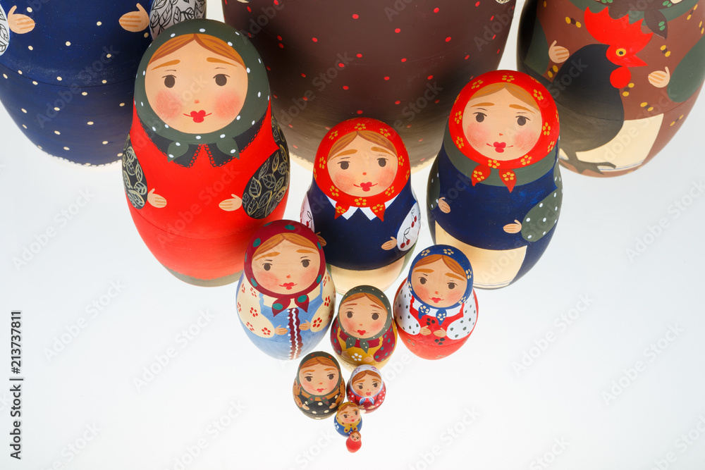 Wall mural Set of Russian dolls babushka matryoshka isolated on white