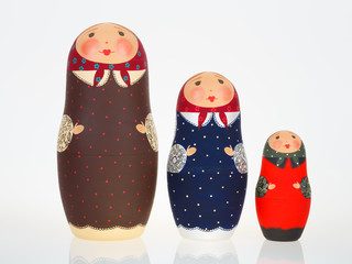 Three Russian dolls babushka matryoshka isolated on white background
