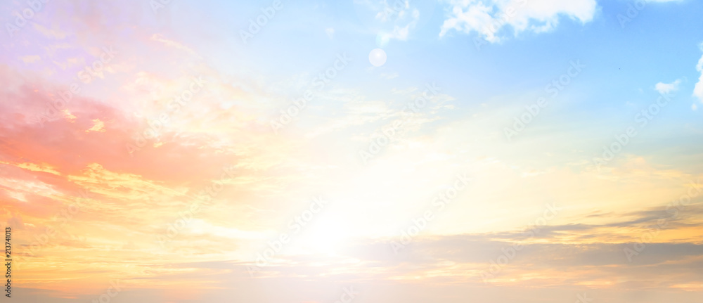 Wall mural background of colorful sky concept: dramatic sunset with twilight color sky and clouds