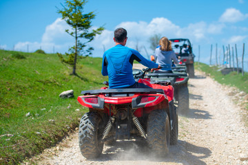 man riding atv vehicle on off road track ,people outdoor sport activitiies theme