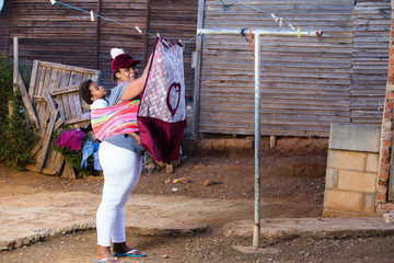 Black mom busy with the washing