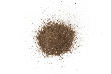 Ground black pepper, powder pile, peppercorn isolated on white background, top view