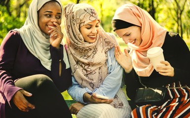 Young muslim girls laughing and having fun