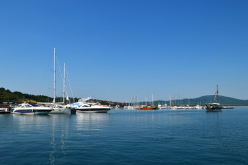Fototapeta na wymiar Boat parking in summer. Marina lot and boats moored in bay.
