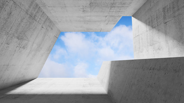 Concrete interior with blue cloudy sky
