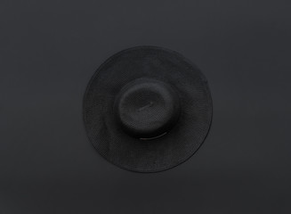 black hat on a black isolated background