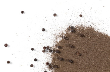 Black ground pepper powder pile with grains, peppercorn isolated on white background, top view