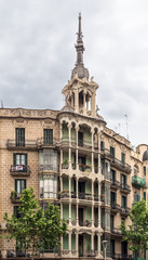 Obraz premium Balconies of casa (house) Josefa Villanueva - one of the most important Modernista legacies. Balconies are built with a structure of graceful columns and crowned by dome surmounted by a slender needle