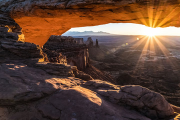 Mesa Arch in Moab Utah with sunrise and canyon 