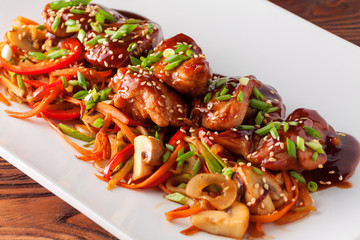 Teriyaki chicken grill with sliced vegetables