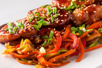 Teriyaki chicken grill with sliced vegetables