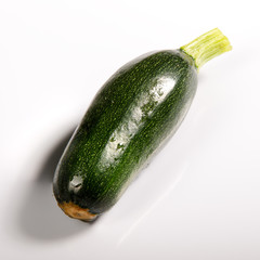 Fresh cropped green Zucchini; Offer in the vegetable market; Summer squash
