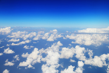 Fototapeta na wymiar View of the sky from airplane window during flight