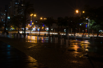 Fountain colored water show. Colorful fontain light in city