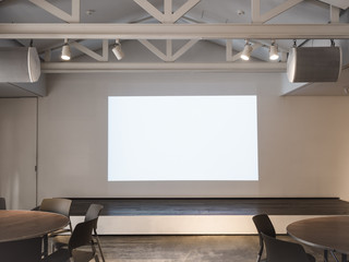 Mock up Screen in Meeting room with table and seats Business presentation