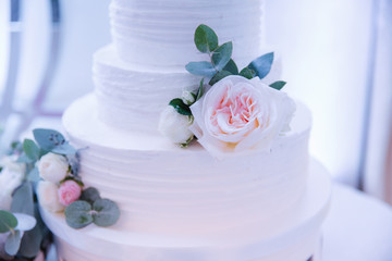 Beautiful wedding cake decorated with flowers