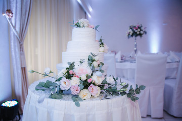 Beautiful wedding cake decorated with flowers