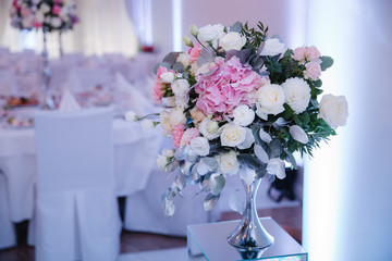 Wedding bouquet in restaurant on the table