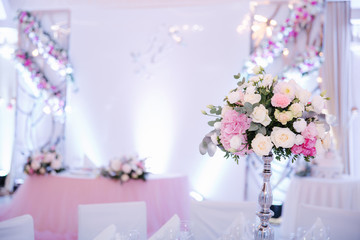 Wedding bouquet in restaurant on the table