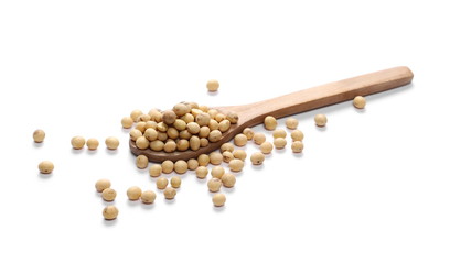 Organic raw soybean flakes with wooden spoon, isolated on white background