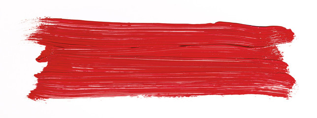 Red brush stroke isolated over white background