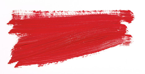 Red brush stroke isolated over white background