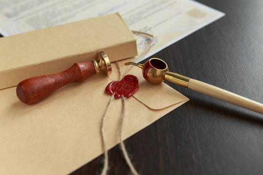 Contract waiting for a notary public sign on desk. Notary public accessories