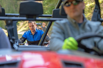 man riding atv vehicle on off road track ,people outdoor sport activitiies theme