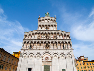 Naklejka premium White marble ornamental portal of San Michele in Foro - Roman Catholic basilica in Lucca, Tuscany, Italy.