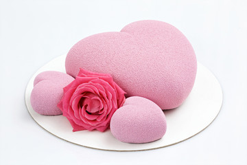 Heart pink cake on white background