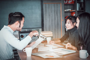 business partners team discussing documents and ideas at meeting 