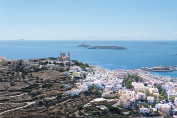 Naklejka premium Panoramic view of Ermoupoli city of Syros Island in Cyclades, Greece. Top view of the colorful houses, the port and the Orthodox Anastaseos church