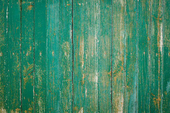 Textura de fondo de madera decapada verde con listones verticales