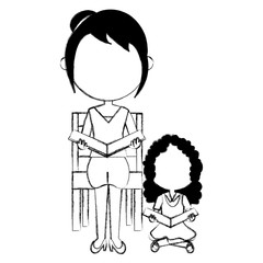 woman teacher with girl in chair